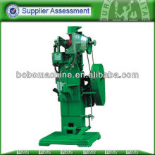 Suitcase riveting machine